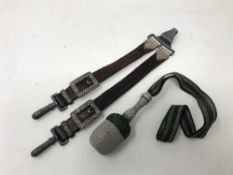 A pair of brown leather hanging straps later fitted with second pattern Luftwaffe buckles and