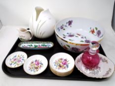 A tray containing cranberry glass perfume bottle,