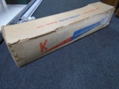 A knitmaster knitting machine in box.