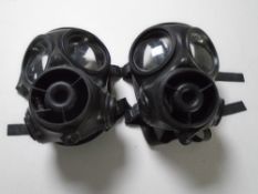Two gas masks.