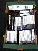 A Sony Playstation 2 Slim together with a Playstation NAMCO G-Con 45 light gun and approximately 45