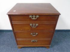 A 19th century mahogany commode chest.