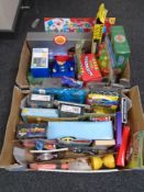 Two boxes containing a quantity of new novelty toys.