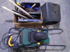 A box containing assorted hand tools, socket set,