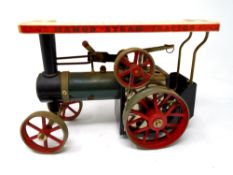 A Mamod steam tractor.