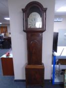 A 19th century mahogany longcase clock case with painted dial signed Thos S Howlette,