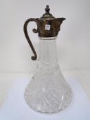 A cut glass and plated claret jug.