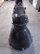 An industrial halogen spotlight (red).