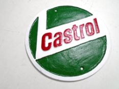 A cast iron wall plaque,