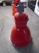 An industrial halogen spotlight (red).