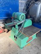 A 'Zip' Cross-Cut saw by Gryphon Brook Motors Ltd.