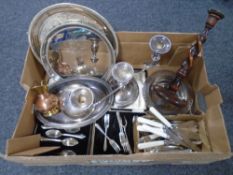 A box of plated wares including cutlery, three sconce table candelabrum, serving trays,