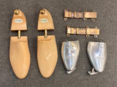 A pair of Harrods of Knightsbridge vintage metal shoe stretchers,