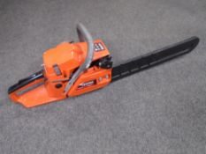 A Vehpro 58cc petrol chain saw.