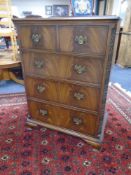 A Chapman's Siesta mahogany two-over-three five drawer chest.