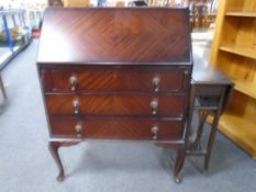 A mahogany Queen Anne writing bureau together with a Sutherland table.