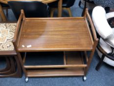 A 20th century Danish teak tea trolley designed by Johannes Andersen for CFC Silkeborg