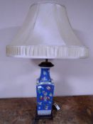 A Chinese porcelain vase converted to a table lamp.