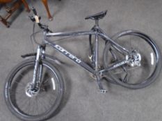 A gent's Carrera Vengeance front suspension mountain bike.