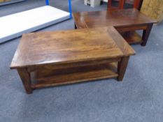 A pair of two-tier coffee tables.
