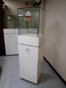 A jeweller's glass display cabinet on stand with keys.