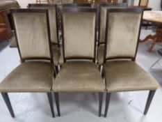 A set of six contemporary high backed dining chairs in brown dralon