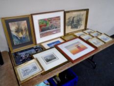 A crate containing a quantity of pictures including a limited edition prints after Richard Marshall,