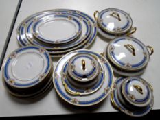 A collection of 28 pieces of Limoges gilt-rimmed dinnerware.