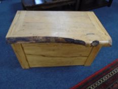 A rustic pine blanket box.