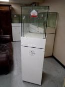 A jeweller's glass display cabinet on stand.