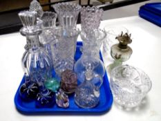 A tray containing 20th century glassware including paperweight, decanters with stoppers,