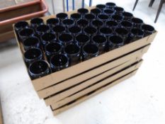 Five boxes containing a large quantity of plastic storage jars with lids.