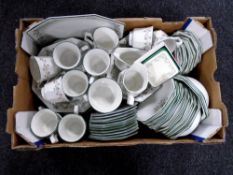 A box containing a large quantity of Johnson brothers dinnerware.