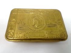 A reproduction 1914 brass Christmas tin.