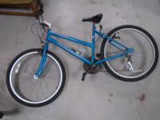 A girl's Tamarind Concept front suspension mountain bike.