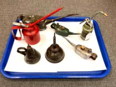 A collection of vintage miniature oil cans and funnels (7)