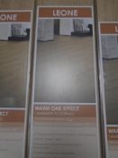 Five packs of Leone warm oak effect laminate flooring.