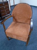 A 20th century beech framed armchair.