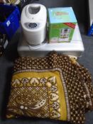 A Silvercrest bread maker together with a Hinari steamer,