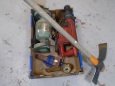 A pickaxe together with a box containing barometer, bench vice,