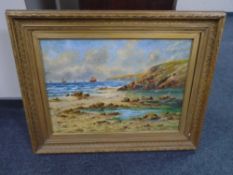 Robert J Pollard II : Boats of a rocky coastline, oil-on-canvas, in gilt frame.