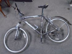 A gent's Muddyfox Anarchy 200 front suspension mountain bike.