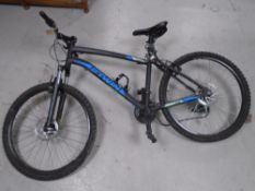 A BTwin Rockrider 340 front suspension mountain bike.