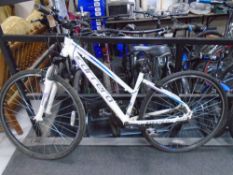 A lady's Carrera Crossfire front suspension mountain bike.