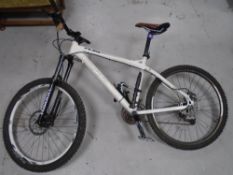 A gent's Carrera Fury front suspension mountain bike.