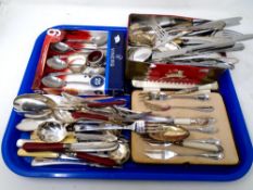 A tray containing miscellaneous cutlery, Viners teaspoons, set of cased cake forks.