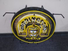 A Boddingtons illuminated display sign.