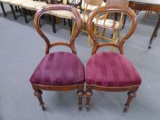 A pair of 19th century dining chairs.