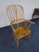 A 19th century elm and beech Windsor armchair