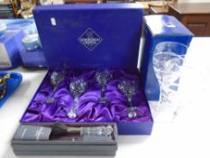 A set of four crystal wine glasses in box together with further Gleneagles crystal glasses,